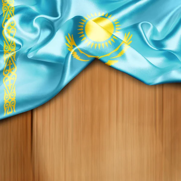 Kazakistan bayrağı sallayarak