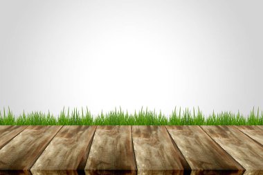 Wooden planks with green grass clipart