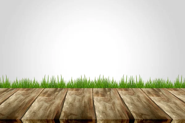 Wooden planks with green grass — Stock Photo, Image