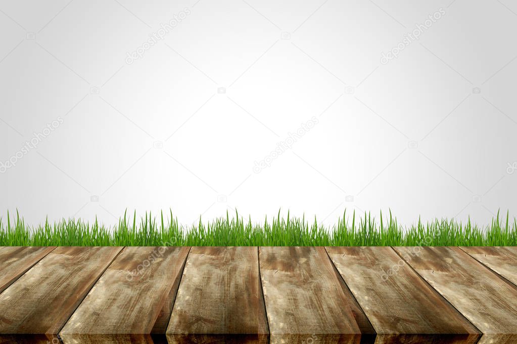 Wooden planks with green grass