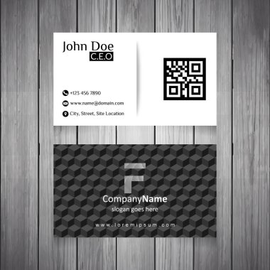 Beyaz ve siyah kartvizit Qr Code ve soyut F logosu ile ahşap arka plan üzerinde soyut