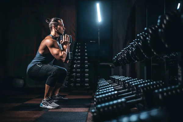 Young athlete has physical workout with barbell in modern gym — Stock Fotó