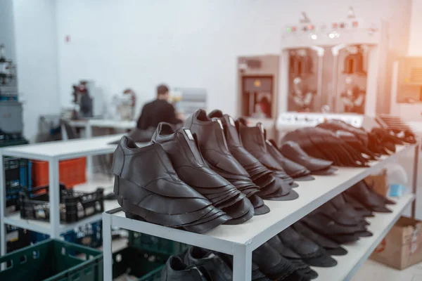 leather molding for modern shoes on factory