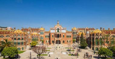 Facade of the main building in the  Sant Pau hospital complex clipart