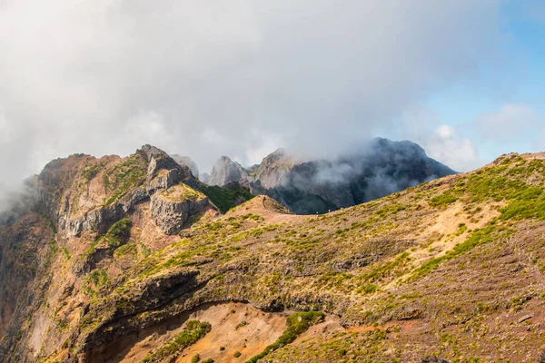 Hiker admiring Pico do Arierio,  Ruivo, Madeira, Portugal, Europe — стокове фото