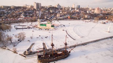 Admiralty Square and the monument to the first ship built in Russia in Voronezh at winter aerial view clipart