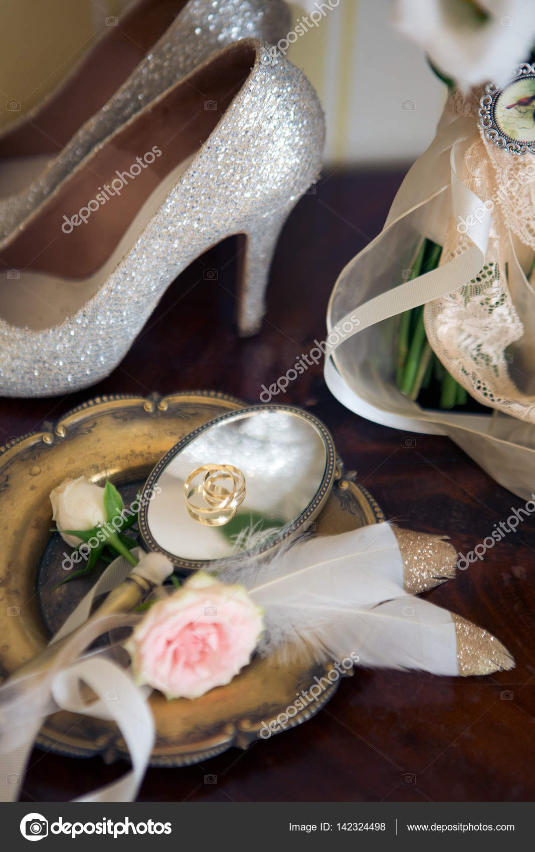 Wedding Decoration Shoes Rings And Bouquet On A Table Stock
