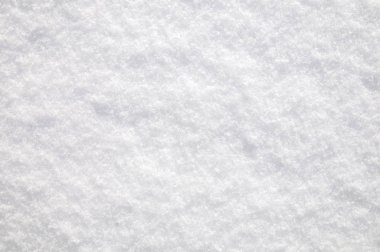 Taze kar dokusunun mavi tonda arkaplanı.