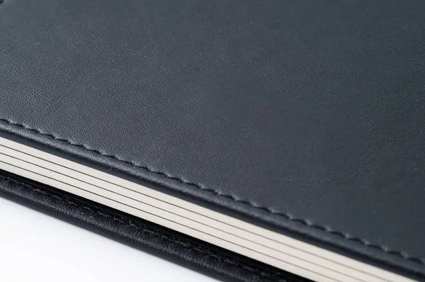 Notebook preto no fundo branco. — Fotografia de Stock