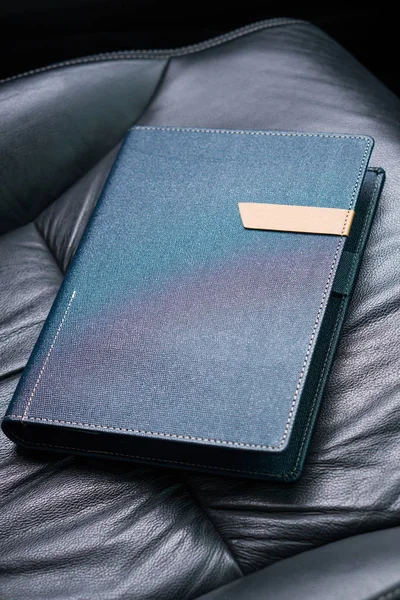 Dark blue colored organizer book