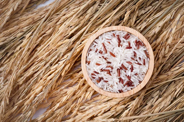 Mixed rice and Rice-berry On wooden bowl.