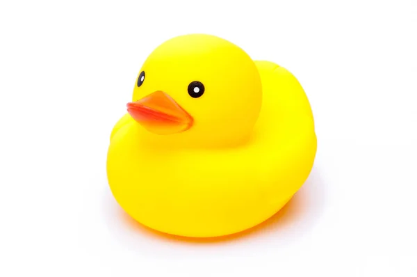 Brinquedo de pato de borracha amarela no fundo branco — Fotografia de Stock