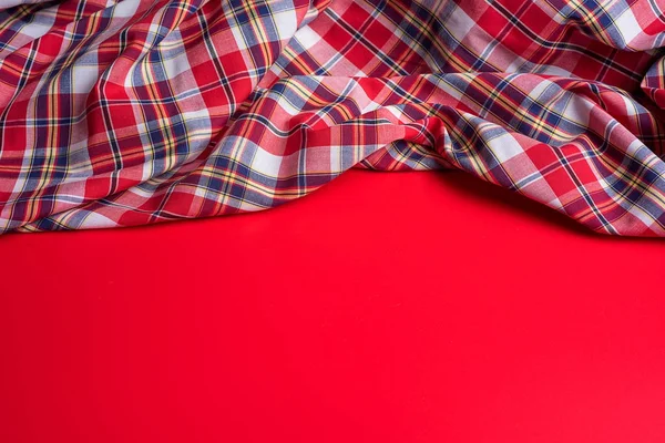 Red Checkered Fabric on red Background — Stock Photo, Image