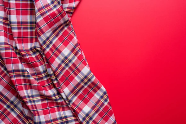 Red Checkered Fabric on red Background