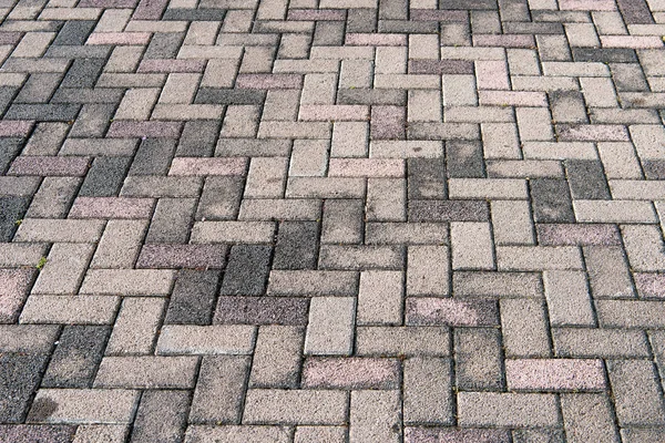 Grijze cement vloer, oude bakstenen blok. — Stockfoto