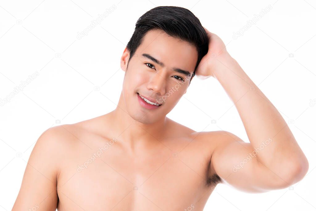Portrait of Handsome young asian man on white background. Concept of men's health and beauty, self-care, body and skin care