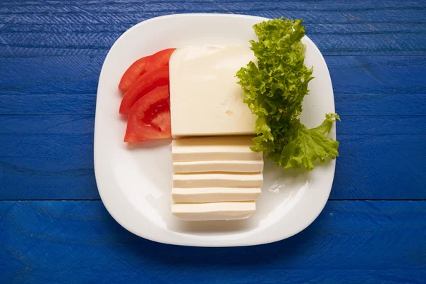 Mozzarella cheese on a table — Stock Photo, Image