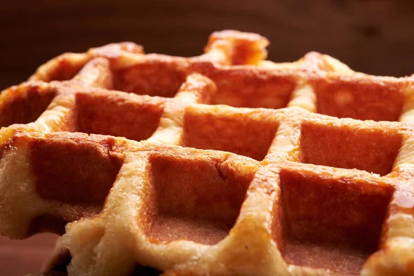 Belgian waffles on a wooden table — Stock Photo, Image