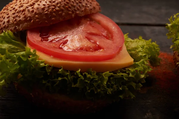 Hamburger on a wooden table — Stock Photo, Image