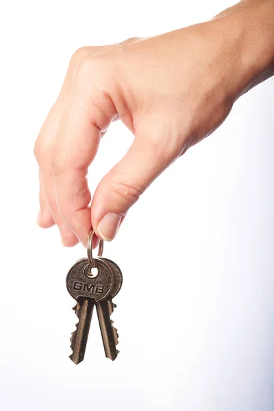 Två nycklar i hand — Stockfoto