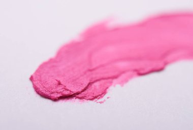 ruj bir arka plan üzerinde pembe smear