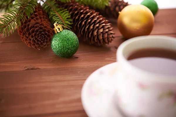 Christmas cones and toys on the table — Stock Photo, Image