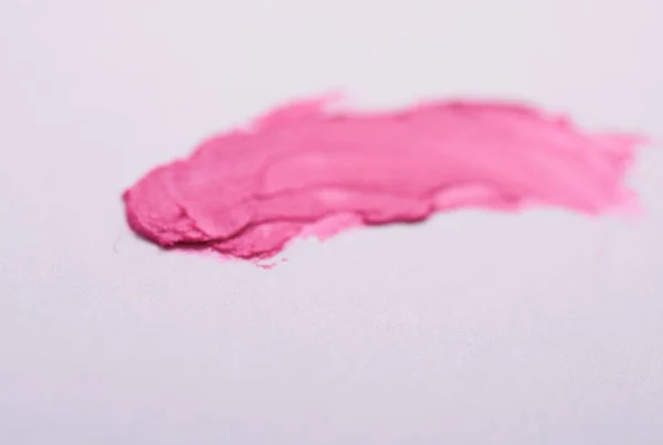 pink smear of lipstick on a background