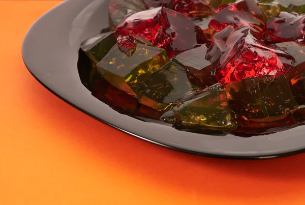 Χρωματιστά jelly σε πορτοκαλί φόντο — Φωτογραφία Αρχείου
