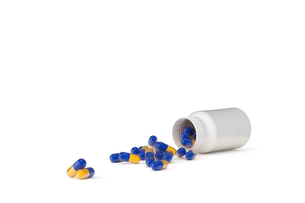 Ilustração 3d de cápsulas de medicamento espalhadas com frasco — Fotografia de Stock