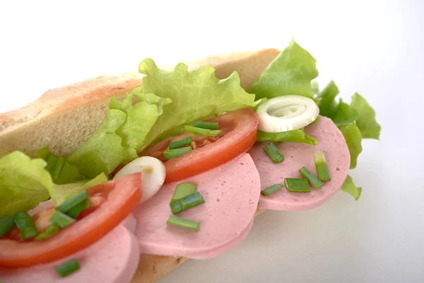 Sandwich with sausage and vegetables isolated — Stock Photo, Image