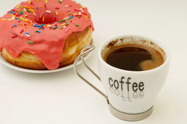 Donuts en koffie — Stockfoto