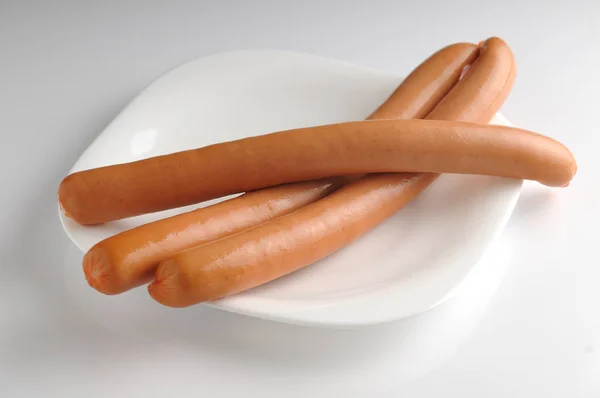 Sausages on a white background — Stock Photo, Image