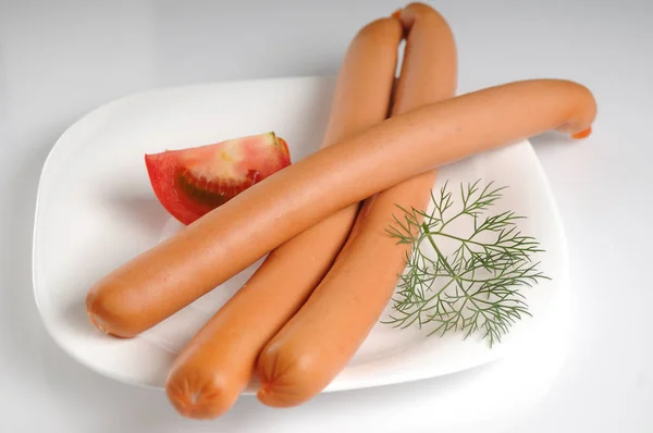 Sausages on a white background — Stock Photo, Image