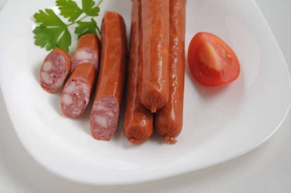 Sausages on a white background — Stock Photo, Image