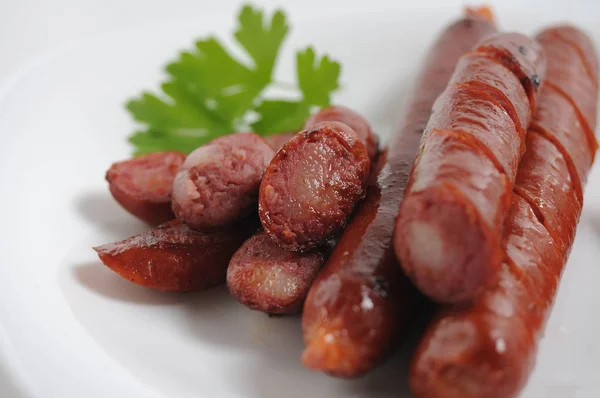 Sausages on a white background — Stock Photo, Image