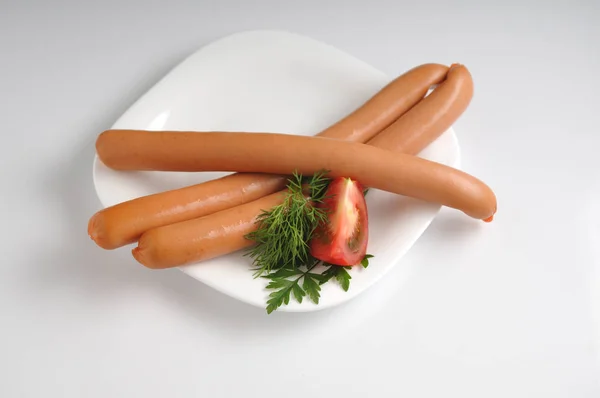 Sausages on a white background — Stock Photo, Image