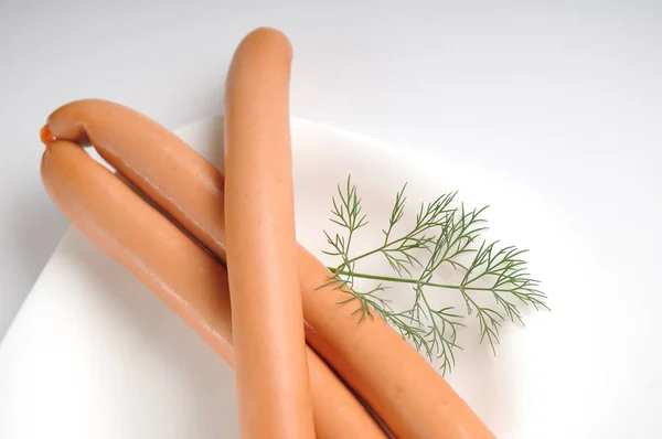 Sausages on a white background — Stock Photo, Image