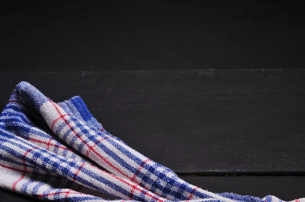 Ahşap bir masada arka plan havlusu.