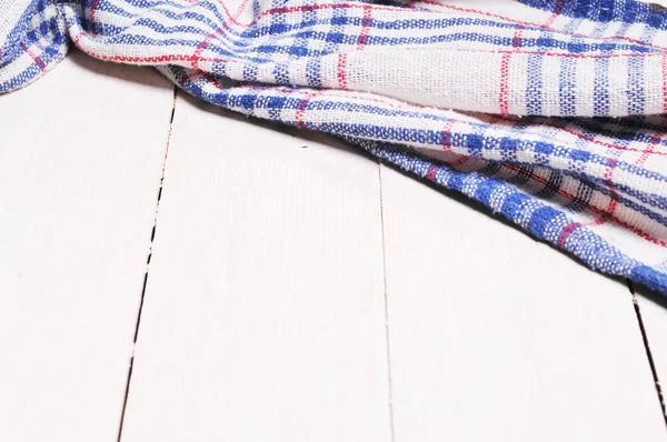 Ahşap bir masada arka plan havlusu.