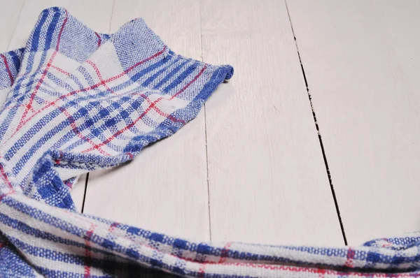 Ahşap bir masada arka plan havlusu.