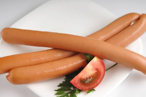 Sausages on a white background — Stock Photo, Image