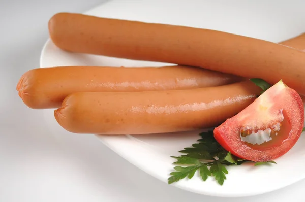 Sausages on a white background — Stock Photo, Image