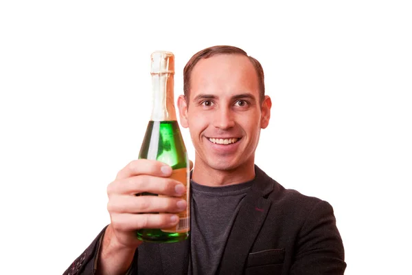 Man håller en flaska champagne och vit bakgrund — Stockfoto