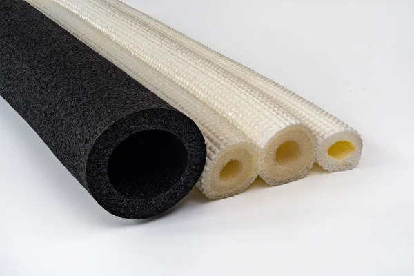 Polyethylene pipe insulation material different diameter and col — Stock Photo, Image