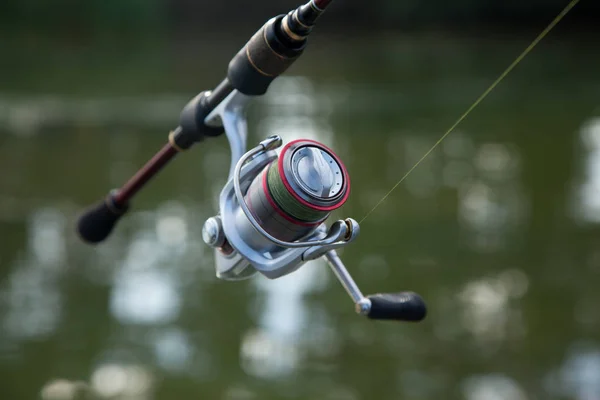 Fiske spinning rulle — Stockfoto