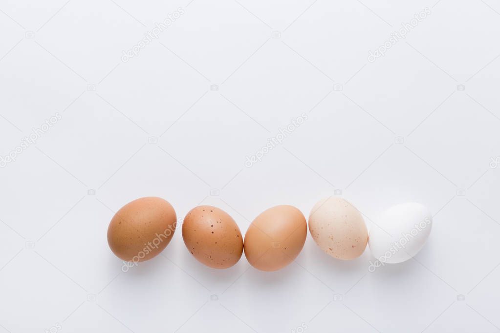 Chicken egg, quail egg. Easter. Isolated white background.