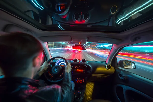 Night city road view from inside car — Stock Photo, Image