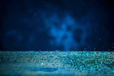 Yeşil parlak ışıklar arka plan. Vintage ışıltı Bokeh