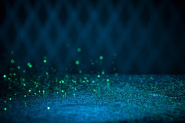 Yeşil parlak ışıklar arka plan. Vintage ışıltı Bokeh