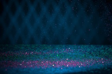 Yeşil ve kırmızı parlak ışıklar arka plan. Vintage ışıltı Bokeh